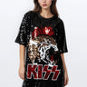 Black sequin KISS graphic oversized tee dress – front view on model.